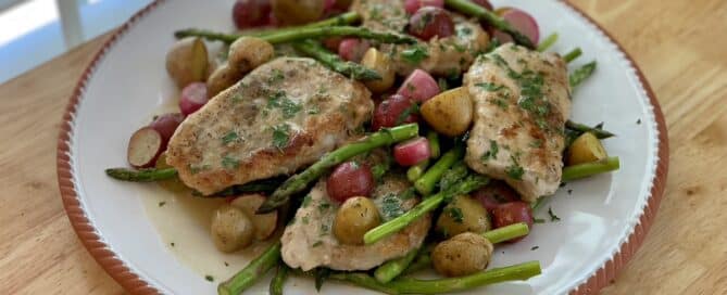 Thinly sliced pork chops teamed with baby potatoes, radishes and asparagus in a yummy anchovy butter sauce.